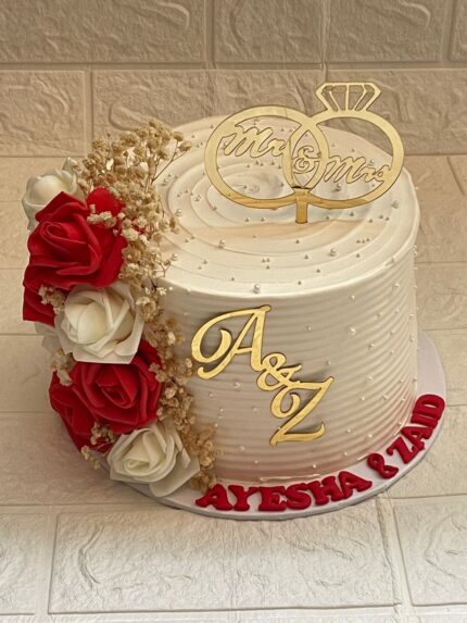 Gold Engagement Ring, White Cake with flowers in Karachi