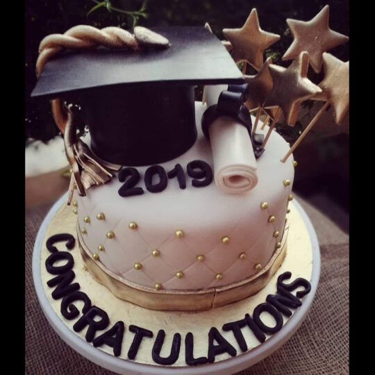 graduation theme fondant cake