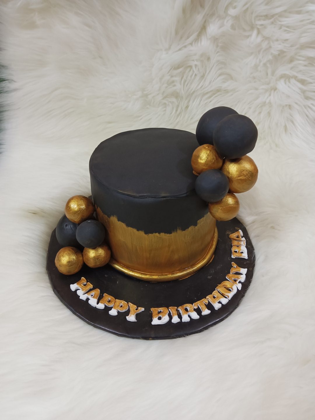 Black and gold theme full fondant cake