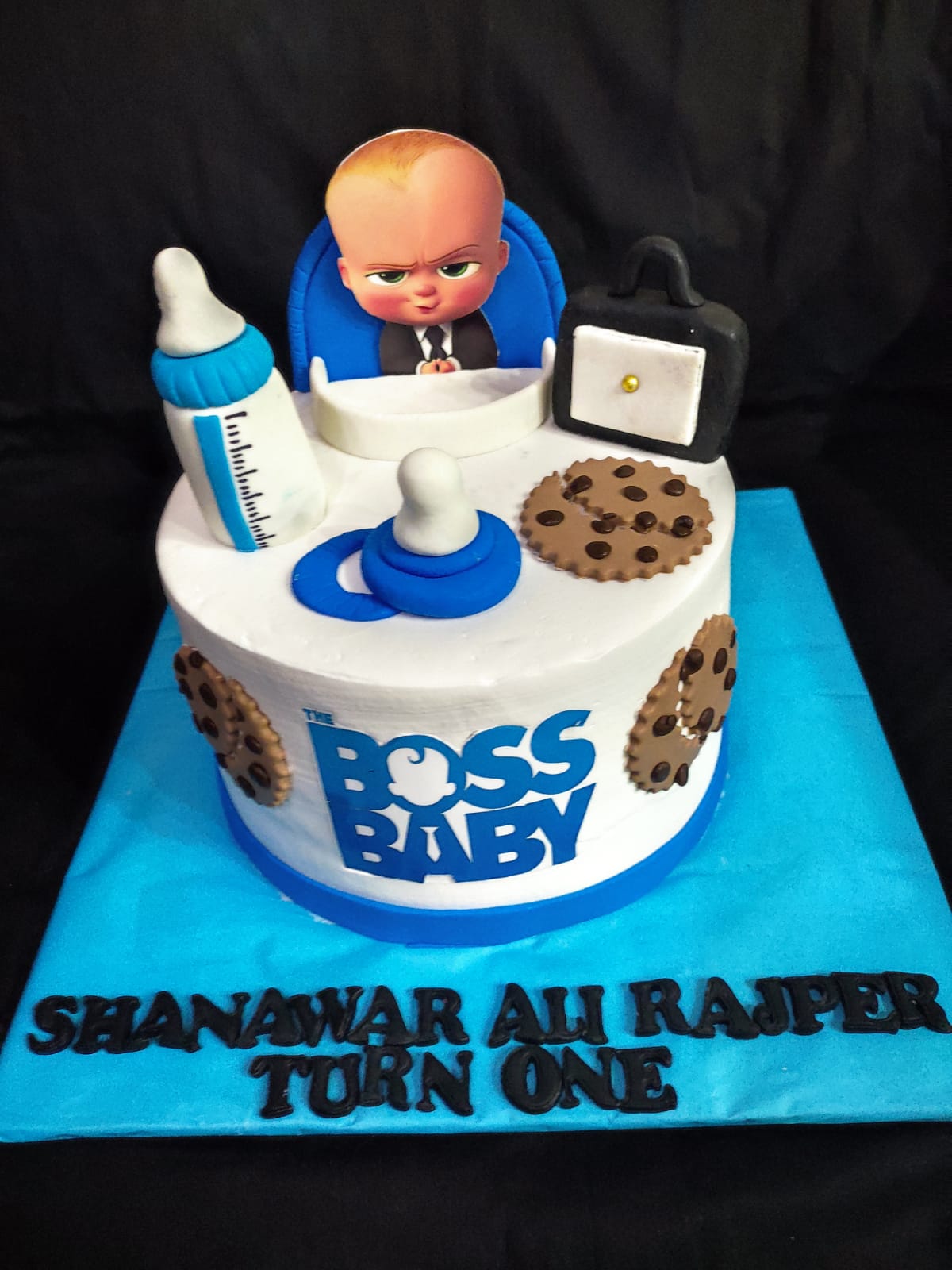 Boss baby theme cream with fondant cake 