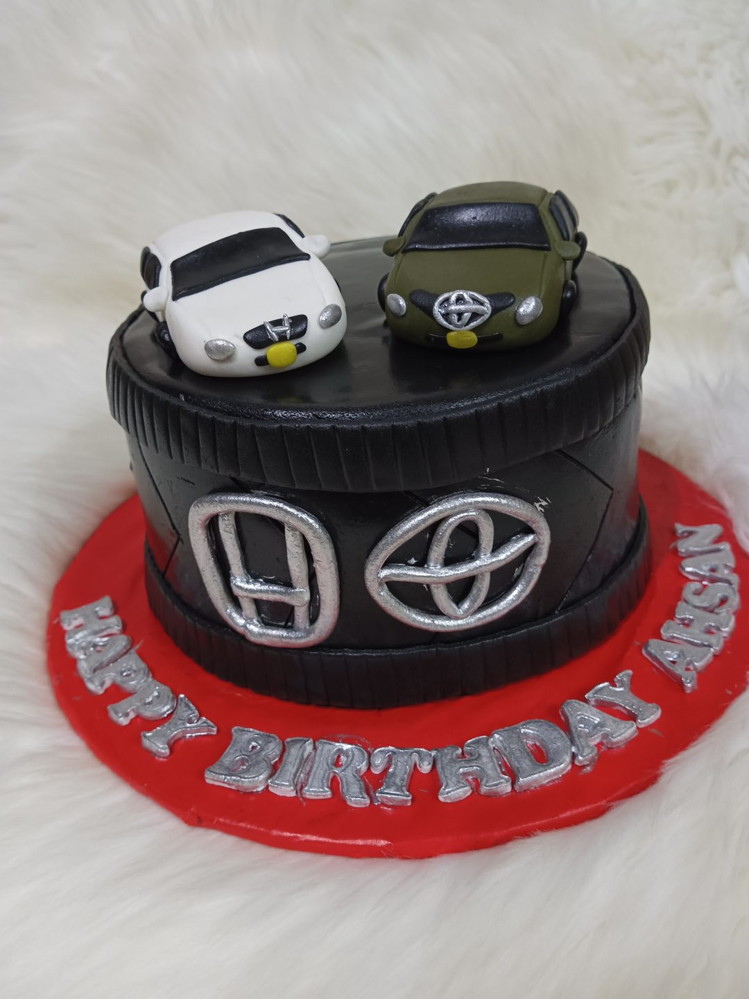 Customized car theme full fondant cake
