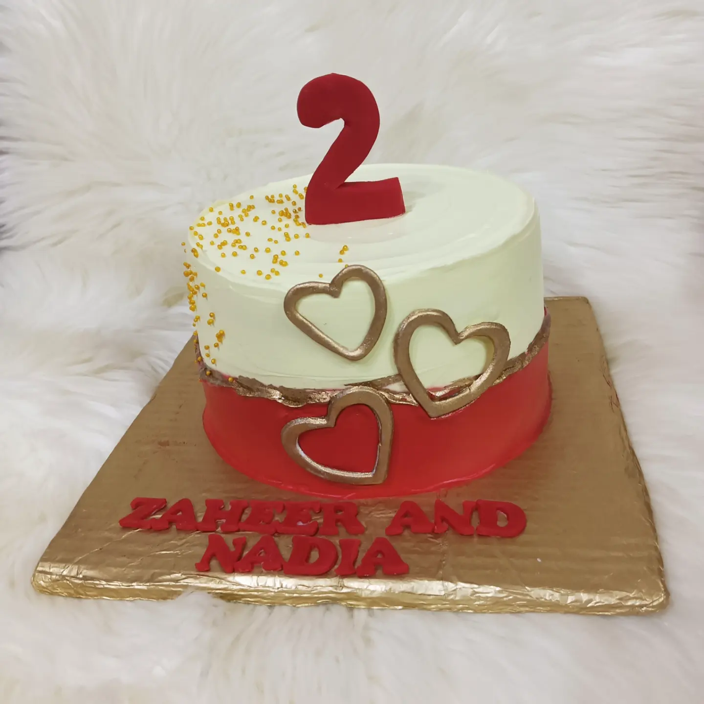 Anniversary theme cream cake 