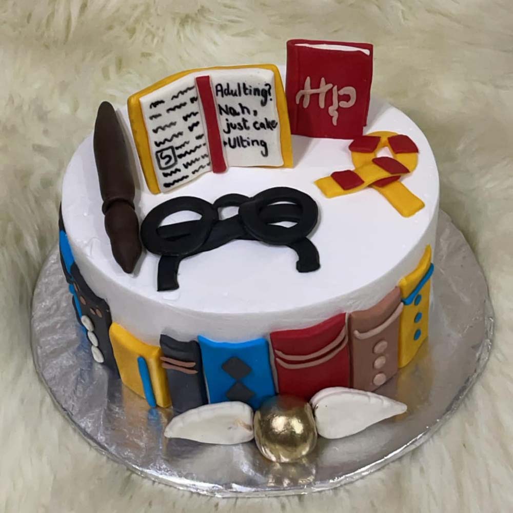 Harry potter theme cream with fondant cake