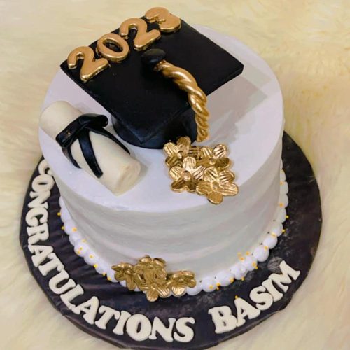 Graduation theme cream with fondant cake