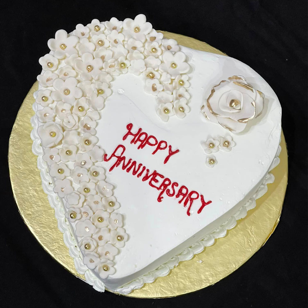 Anniversary theme cream cake