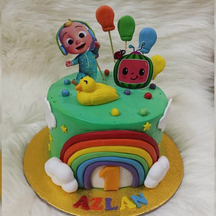 Cocomelon Rainbow Theme Birthday Cake in Karachi with vibrant colors and cartoon characters