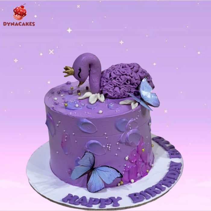 Purple Swan Theme Cream Cake with butterfly decorations, designed for birthdays, available in Karachi