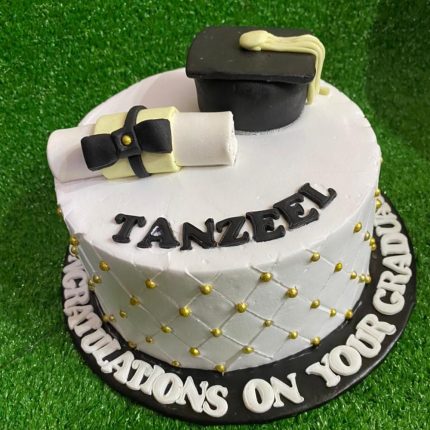 Graduation cake with cap, diploma, and personalized message for with Name