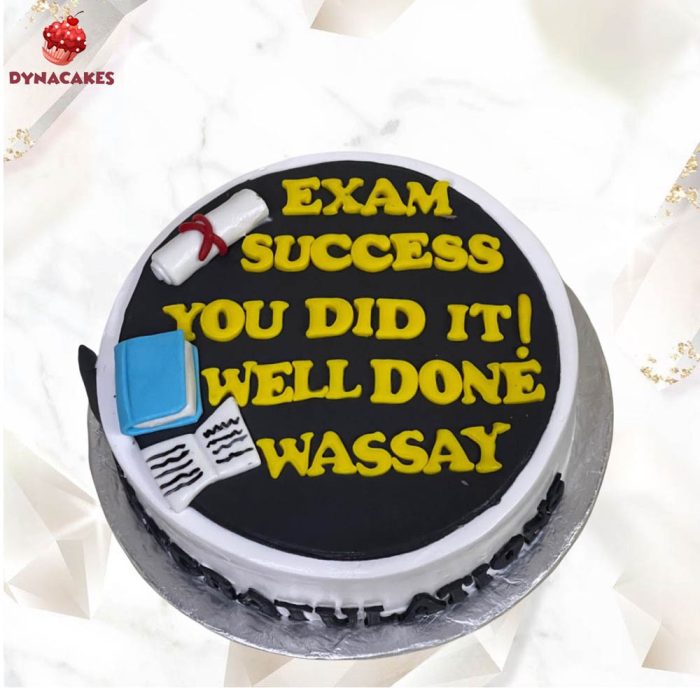 Custom Success Celebration Cake in Karachi with graduation caps, books, and diplomas.