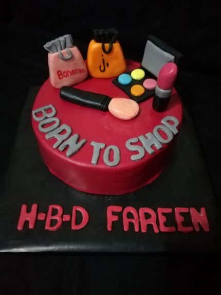 Makeup kit theme fondant cake with lipstick