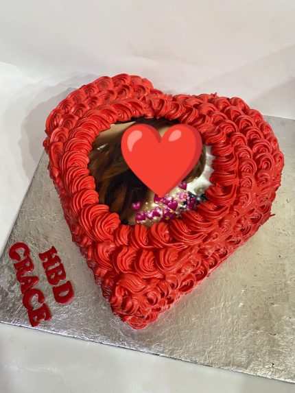 Heart-shaped Picture Perfect Cake in Karachi with edible photo and red frosting.