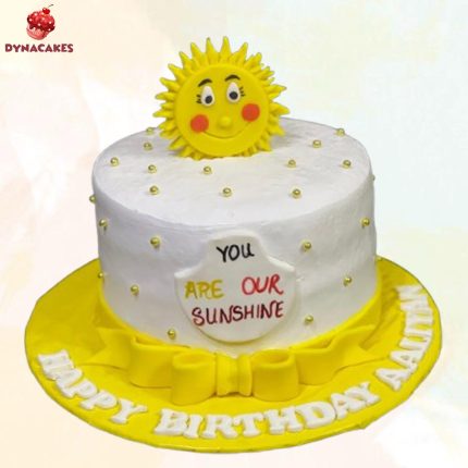 Sunshine Theme Cream Cake with vibrant yellow cream and sun motif, ideal for kids' birthdays in Karachi.