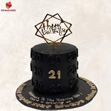 Black and gold themed birthday cake with golden accents, designed for a stylish birthday celebration in Karachi.