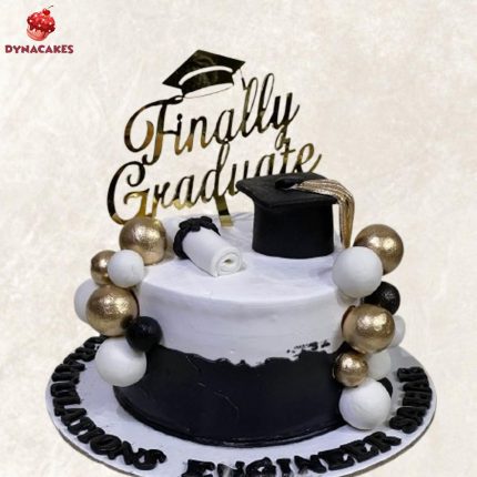 Graduate theme cream cake in Karachi decorated with graduation cap and diploma.