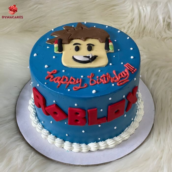 Roblox-themed cake with colorful designs, featuring Roblox characters and avatars, crafted by Dynacakes for gaming celebrations in Karachi.