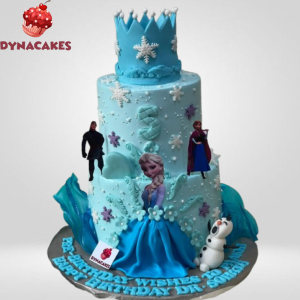 Frozen Barbie Cake with icy blue decorations, snowflakes, and a Barbie doll in a Frozen-themed dress, crafted by Dynacakes.