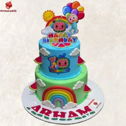 Cocomelon 2-tier cream cake with colorful decorations and character toppers, perfect for kids' birthday celebrations in Karachi.