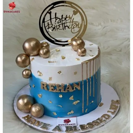 Blue and white themed birthday cake, freshly baked and designed for birthdays and celebrations in Karachi.