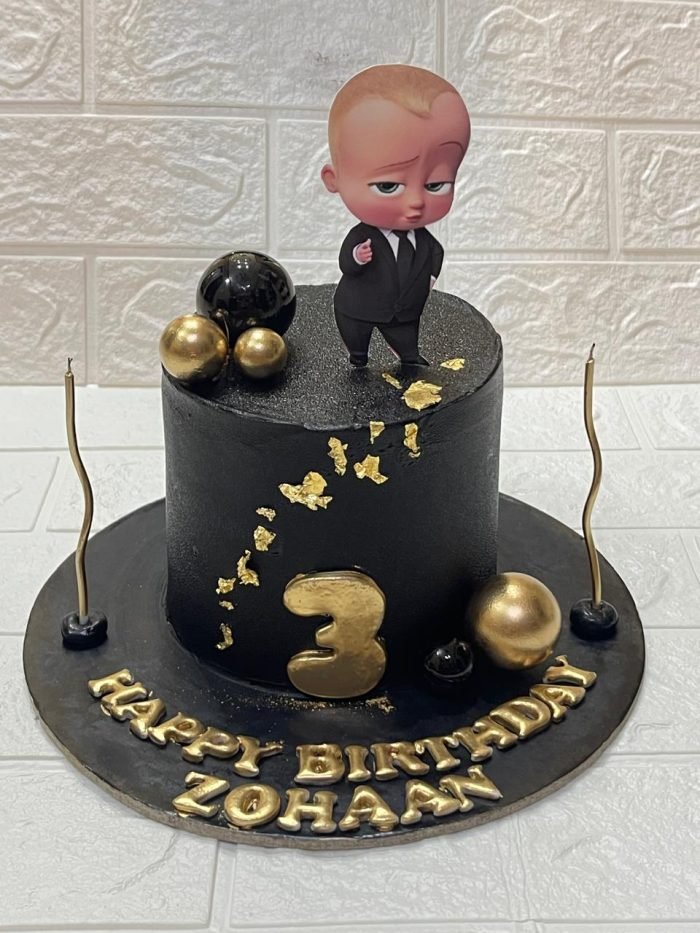 Boss baby black and gold cake