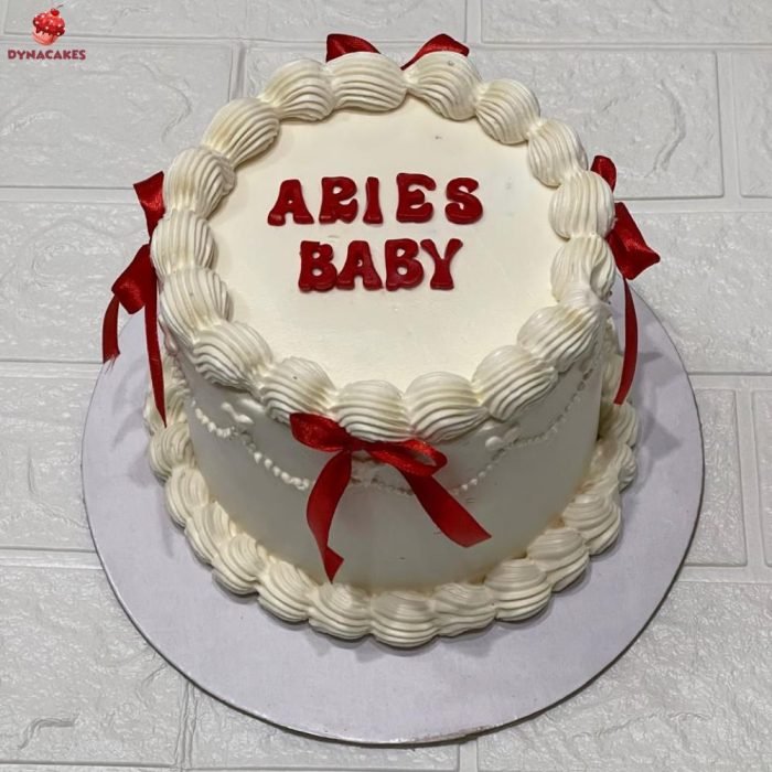 White Vintage Cake with Red Ribbons in Karachi