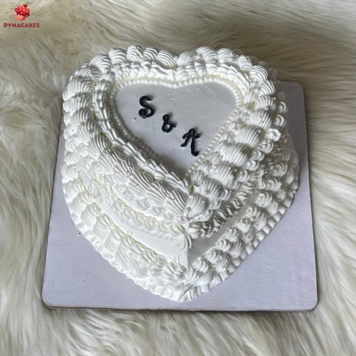 Heart-Shaped white vintage cake in Karachi