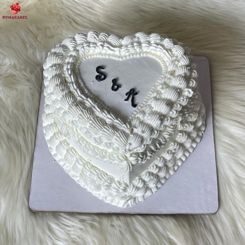 Classic White Heart-Shaped Vintage Cake with Pearls | Simple white vintage cake by dynacakes