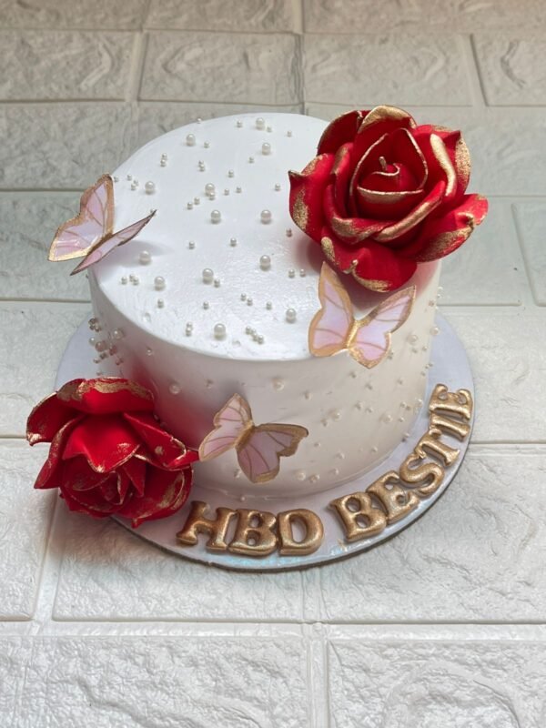 Red Rose & Butterfly Bento Cake for Bestie – white cream cake with red roses, pink butterflies, and pearl decorations from DynaCakes Karachi.
